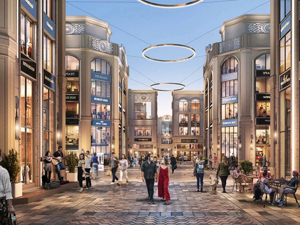 Reach Buzz 114 upscale retail promenade with illuminated facades and luxury shopping boulevard