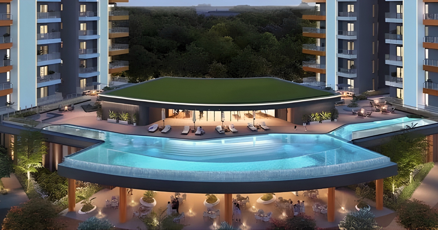 Luxury residential clubhouse with an elevated infinity pool and landscaped courtyard in South City I, one of the posh areas in Gurgaon.