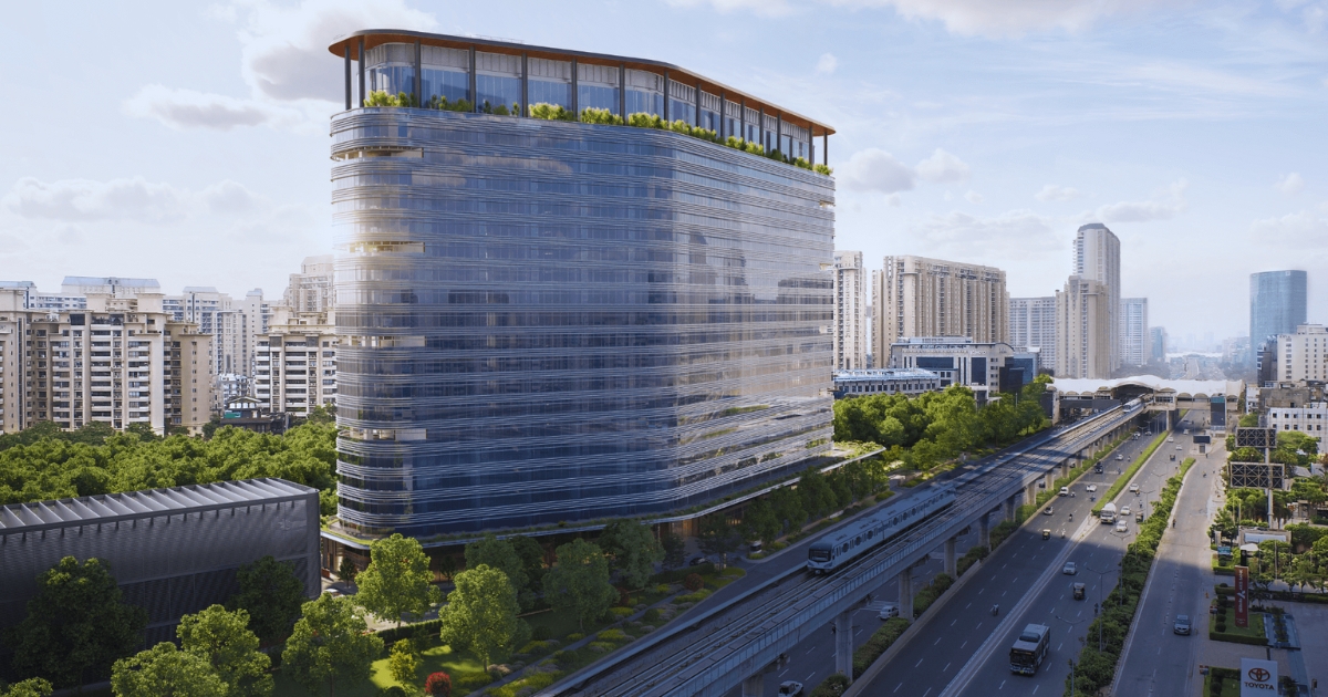 Modern glass high-rise and metro line on Golf Course Road, one of the most posh areas in Gurgaon known for luxury living.