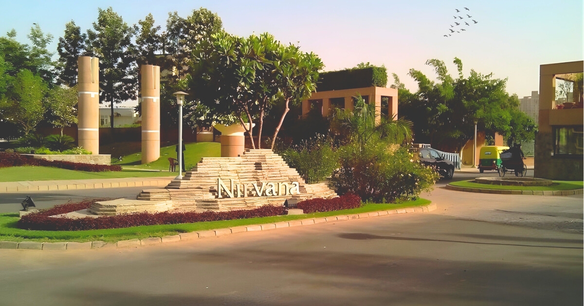 Entrance of Nirvana Country in Gurgaon with landscaped greenery and premium residential surroundings in one of the posh areas in Gurgaon.