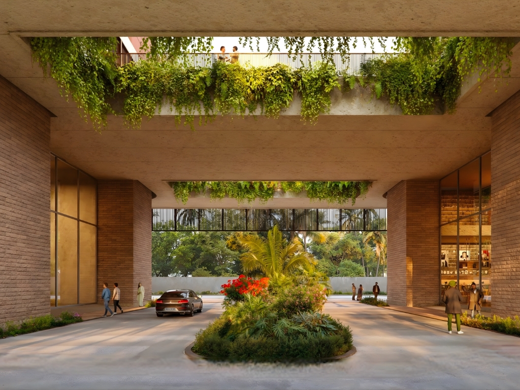 Max Estate 361 Gurgaon grand entrance driveway with lush greenery and modern architectural design
